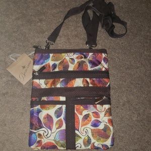 New. Never been used crossbody bag